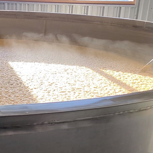 The Alchemical Dance of Water and Yeast: Unraveling the Essence of Flavor in American Craft Whiskey