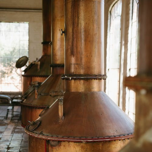 Craft Whiskey: Exploring the Pros and Cons of Using a Pot Still vs. a Column (or Stack) Still for Distillation